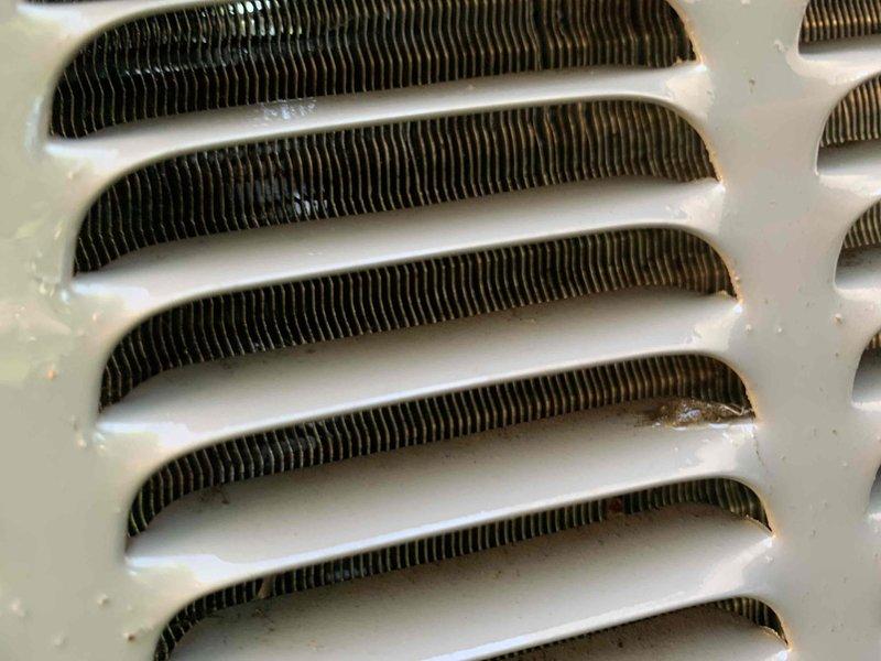 Completed comprehensive cooling system tune-up on outdoor AC unit. Performed standard maintenance procedures including inspection of heat exchanger coil assembly and blower wheel components, verified proper operation of all mechanical systems, and documented equipment condition through photographic records. All components found operating within normal parameters with minor dust accumulation noted on blower assembly.