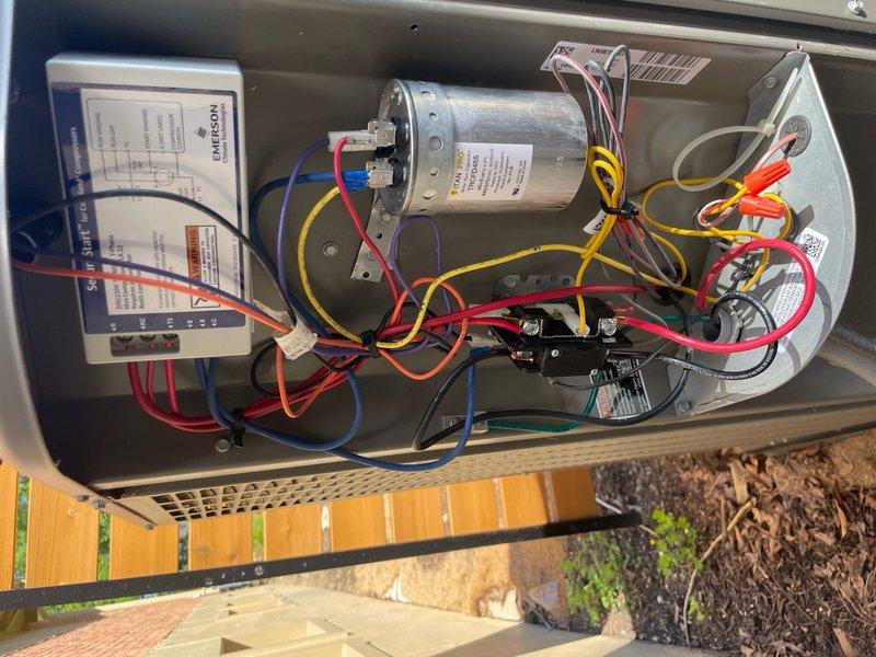 Installed soft start kit on HVAC unit to reduce compressor startup current and improve system efficiency. Replaced failed capacitor under warranty with van stock unit, ensuring proper electrical connections and secure mounting within the equipment cabinet. System tested and verified operational for both heating and cooling modes upon completion.