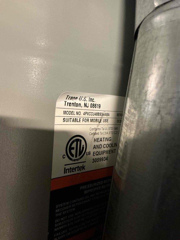 Completed scheduled cooling maintenance on 2-year-old Trane system. Performed comprehensive AC tune-up including inspection of condenser coil, which showed moderate dirt and debris accumulation on fin surfaces, and refrigerant line set evaluation. Customer reported slight pinging noise in refrigerant lines during operation; inspected copper refrigerant lines and connections for potential vibration points or loose mounting. Verified system operational status and all components functioning properly.
