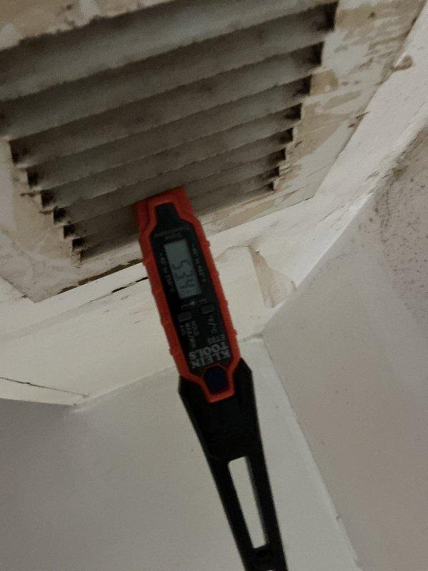Provided temporary cooling solution for client requiring 410A refrigerant system. Performed diagnostic measurements at ceiling return air vent to assess airflow and temperature conditions, then accessed HVAC equipment in attic space to complete necessary service work and ensure proper system operation.