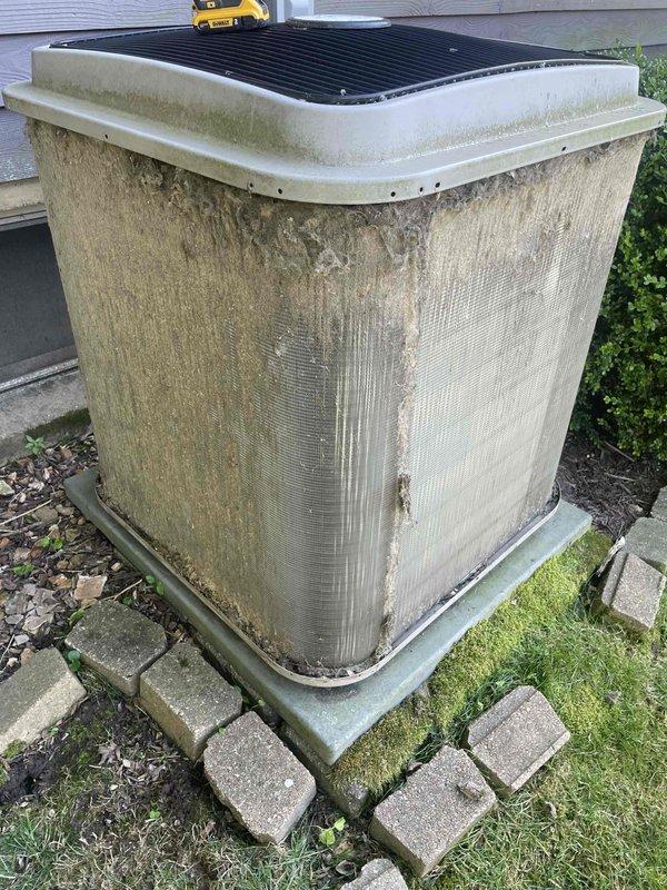 Completed comprehensive tune-up service on a 9-year-old residential air conditioning system as part of a Home Depot promotional maintenance agreement. Performed full inspection of outdoor condenser unit, which showed significant weathering, organic growth, and dirt accumulation on exterior panels and coil fins, and indoor air handler including blower assembly and electrical connections. All system components were evaluated, cleaned as needed, and confirmed to be operating within normal parameters despite visible exterior deterioration from prolonged outdoor exposure.