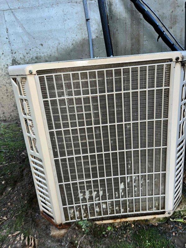 Completed cooling tune-up on aging outdoor condenser unit located at side of residence. Performed comprehensive maintenance including inspection of coils which showed significant dirt accumulation and weathering, checked refrigerant levels, tested electrical components, and evaluated overall system performance. Replaced 20x20x2 pleated air filter and noted visible rust corrosion on unit casing requiring future attention.
