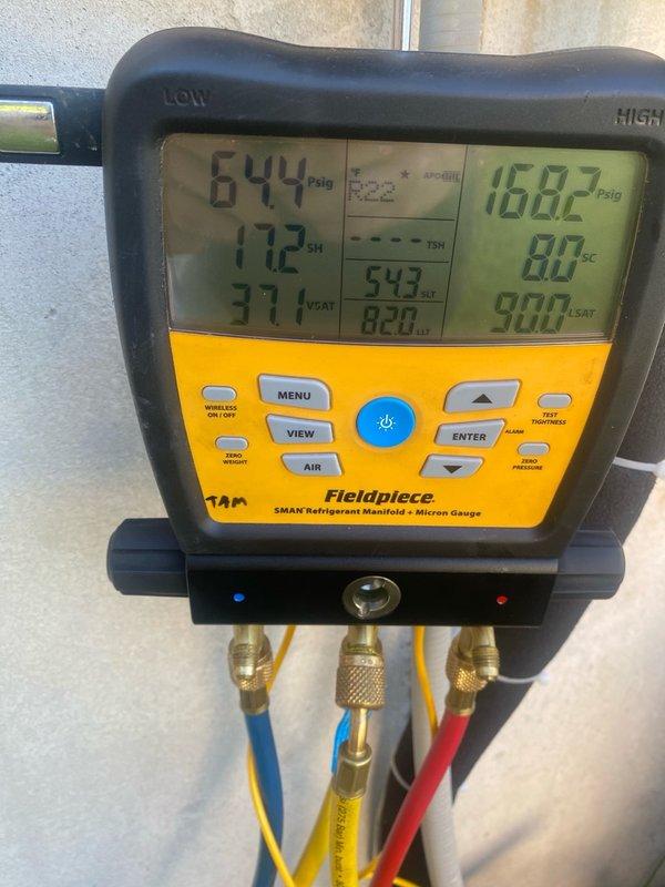 Completed comprehensive cooling system tune-up on 10-year-old residential AC unit, including refrigerant pressure analysis using digital manifold gauge showing operating pressures and system diagnostics. Performed condenser coil fin combing to restore airflow efficiency on outdoor unit, inspected fan operation and overall system components, and documented equipment condition with diagnostic readings for customer records.