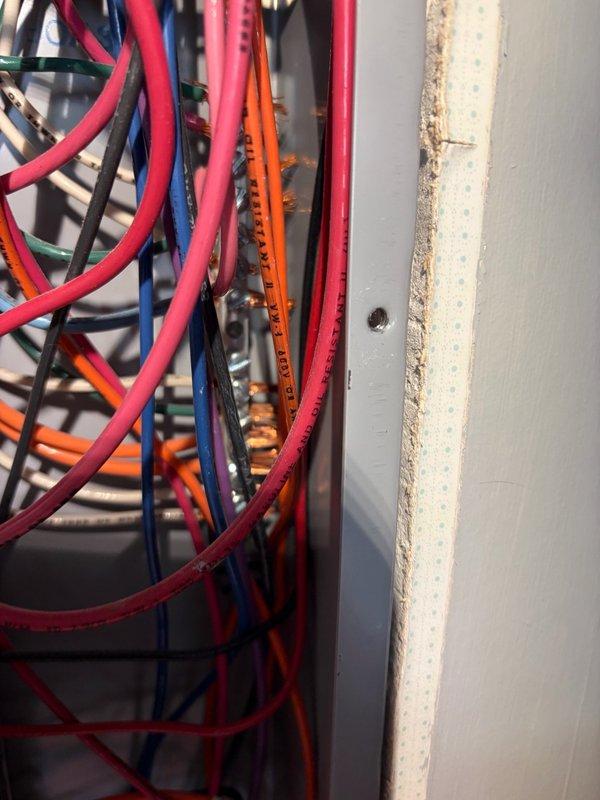 Responded to service call for flickering lights in dining room. Upon inspection, identified loose wire connections at the electrical panel affecting the dining room circuit. Tightened all wire terminations at the breaker and verified proper seating of the circuit breaker. Tested all connections for secure contact, confirmed voltage stability, and verified the dining room lighting operates without flickering. Panel inspection revealed multiple circuits in serviceable condition with no immediate safety concerns.