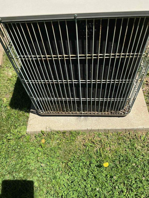 Completed cooling season tune-up on a 12-year-old ground-mounted air conditioning unit. Performed comprehensive maintenance inspection including checking refrigerant levels, cleaning condenser coils, testing electrical connections, verifying proper airflow, and ensuring optimal system operation. Unit is functioning properly with no issues identified during service.