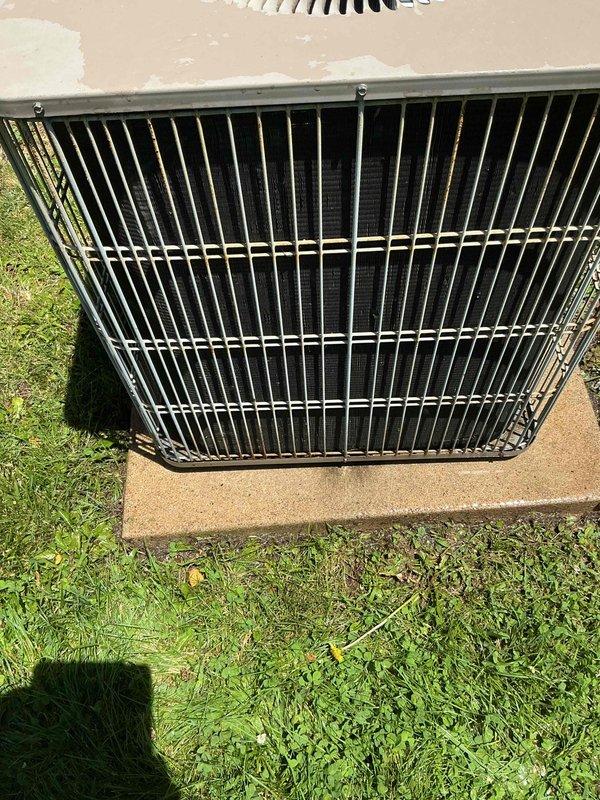 Completed cooling season tune-up on a 12-year-old ground-mounted air conditioning unit. Performed comprehensive maintenance inspection including checking refrigerant levels, cleaning condenser coils, testing electrical connections, verifying proper airflow, and ensuring optimal system operation. Unit is functioning properly with no issues identified during service.