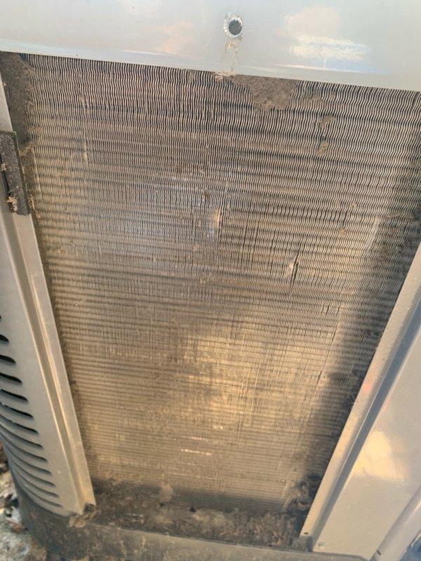 Completed comprehensive tune-up service on a 10-year-old residential air conditioning system located on the side of the home. Performed standard maintenance procedures on the outdoor condenser unit and indoor evaporator coil, including inspection of all major components, electrical connections, and refrigerant levels. Noted moderate dust and debris accumulation on the evaporator coil fins, which was addressed during the maintenance service to restore optimal airflow and heat exchange efficiency.