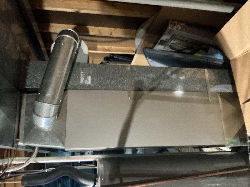 Conducted comprehensive electrical estimate for HVAC system wiring in basement utility area. Assessed existing electrical panel configuration with complex multi-conductor wiring connections to air handler unit, evaluated metallic flexible conduit routing between equipment and control panel, and documented current installation including PVC conduit runs and circuit breaker arrangement. Provided detailed wiring recommendations for system integration and code compliance requirements.