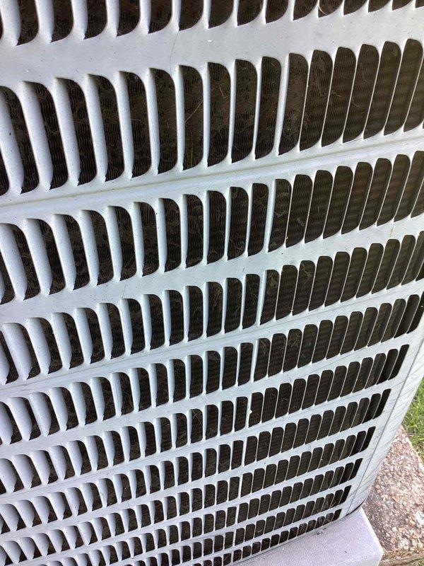 Responded to service call for air conditioning unit struggling to maintain temperature with water leakage in basement. Upon inspection, found outdoor condensing unit operational but system experiencing drainage issues causing water accumulation in basement near water heater. Assessed evaporator coil drain line for blockages and verified proper condensate removal. Identified compromised drainage system as primary cause of water intrusion. Cleared condensate line obstruction and confirmed proper water flow away from living space. Verified system cooling capacity restored to normal operation and educated customer on proper maintenance to prevent future drainage issues.