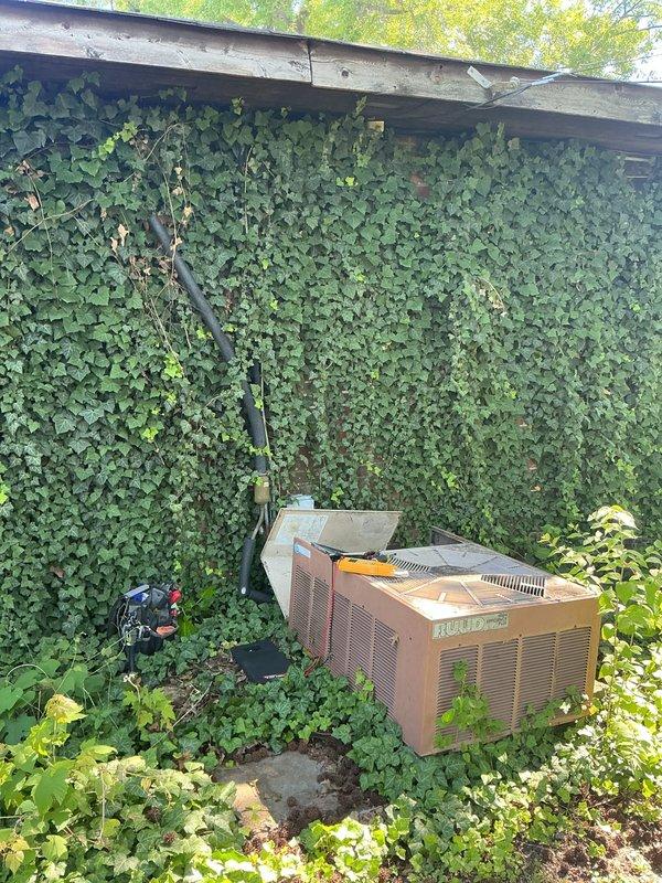 Responded to no-cooling complaint on residential outdoor unit over 10 years old. Upon arrival, found unit blowing warm air as reported. Performed diagnostic testing with multimeter on condenser components to identify system failure. Accessed internal components by removing top panels and tested electrical systems and refrigerant circuit. Unit showed signs of age-related wear and required repair to restore cooling function.