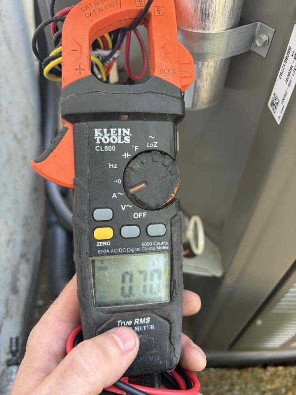 Completed comprehensive spring tune-up on a one-year-old Lennox air conditioning system with no reported issues. Performed electrical diagnostics using digital clamp meter to verify proper amperage draw and system performance, inspected outdoor condenser unit including coil condition and refrigerant lines, and confirmed all components operating within manufacturer specifications.