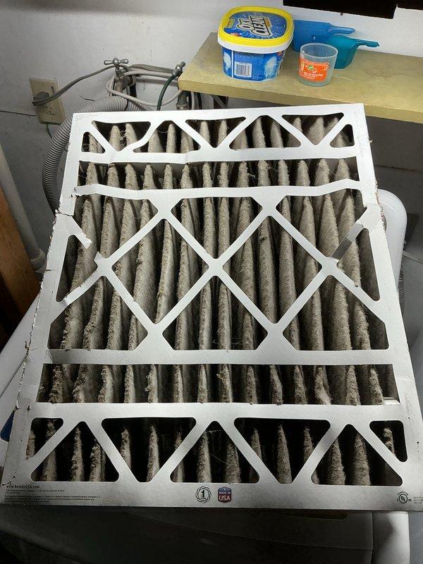 Responded to report of water leaking inside HVAC unit located in utility closet. Upon inspection, found active condensate drainage issue at evaporator coil assembly. Identified clogged condensate drain line causing water to overflow from drain pan. Cleared blockage from PVC condensate line and verified proper drainage flow. Replaced heavily soiled air filters which were restricting airflow and contributing to excessive condensation. Cleaned drain pan and tested system operation to confirm leak resolved and proper condensate removal restored.
