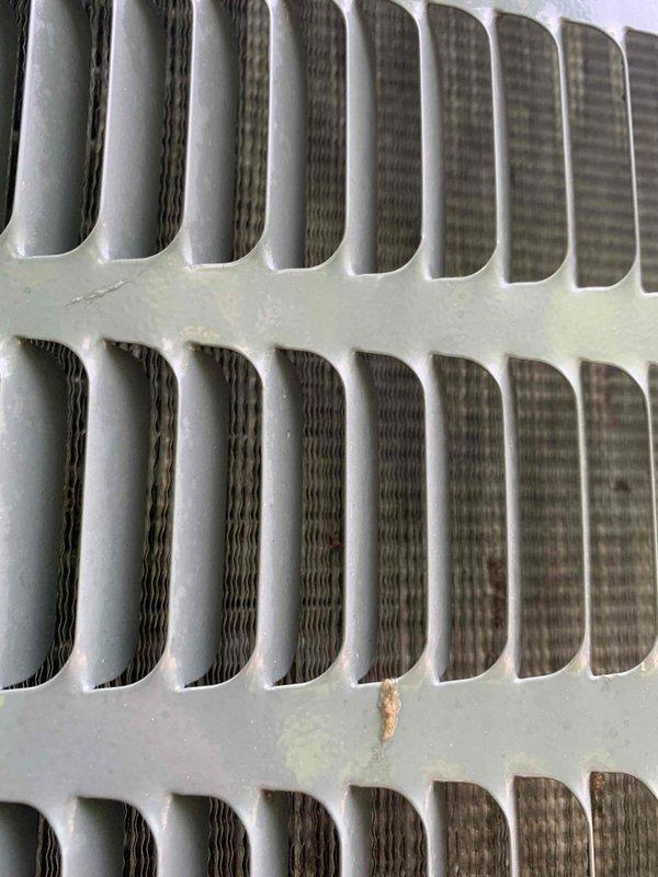 Completed comprehensive cooling system tune-up and maintenance on 15-year-old air conditioning unit. Performed refrigerant pressure analysis using digital manifold gauge, recording superheat at 26.5°F and system pressures at 117.2 psig, confirming proper refrigerant charge and system operation. Inspected condenser coil fins, finding them in clean condition with good airflow capacity, and verified heat exchanger components showing normal wear patterns consistent with system age. System tested and confirmed operational with all parameters within manufacturer specifications.