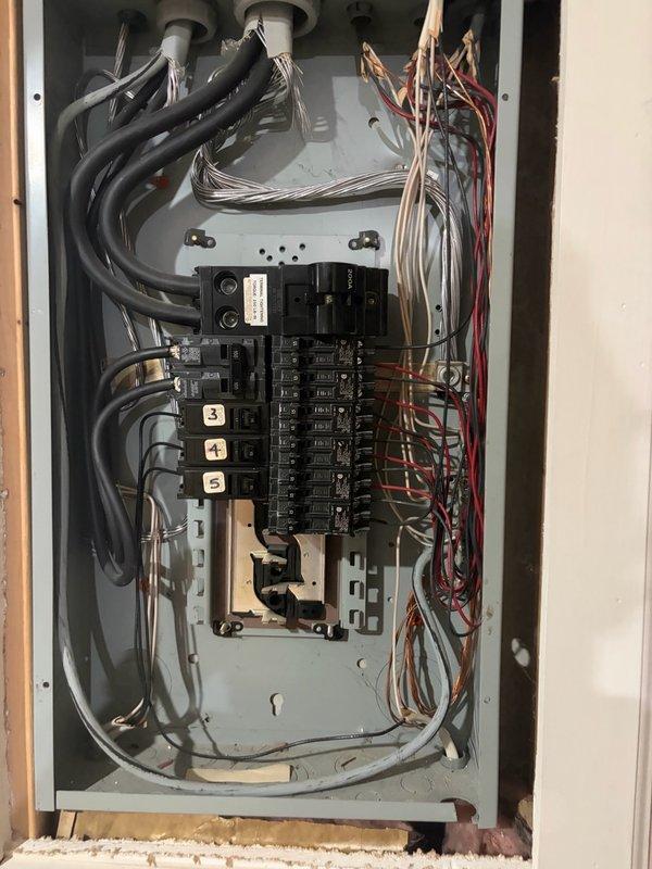Conducted comprehensive site assessment for electric vehicle charging station installation. Evaluated existing electrical infrastructure including main service panel and sub-panel capacity, documented current circuit breaker configuration and available spaces, and photographed panel layout to determine feasibility and electrical requirements for Level 2 EV charger installation.