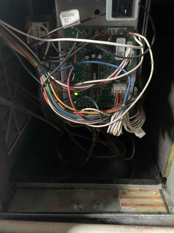 Completed comprehensive cooling system tune-up on 10-year-old residential air conditioning unit located at side of property. Performed full system inspection including control board examination, electrical connections verification, and return air filter assessment. All components found operating within normal parameters, with control board LED indicators functioning properly and airflow pathways clear of obstructions.