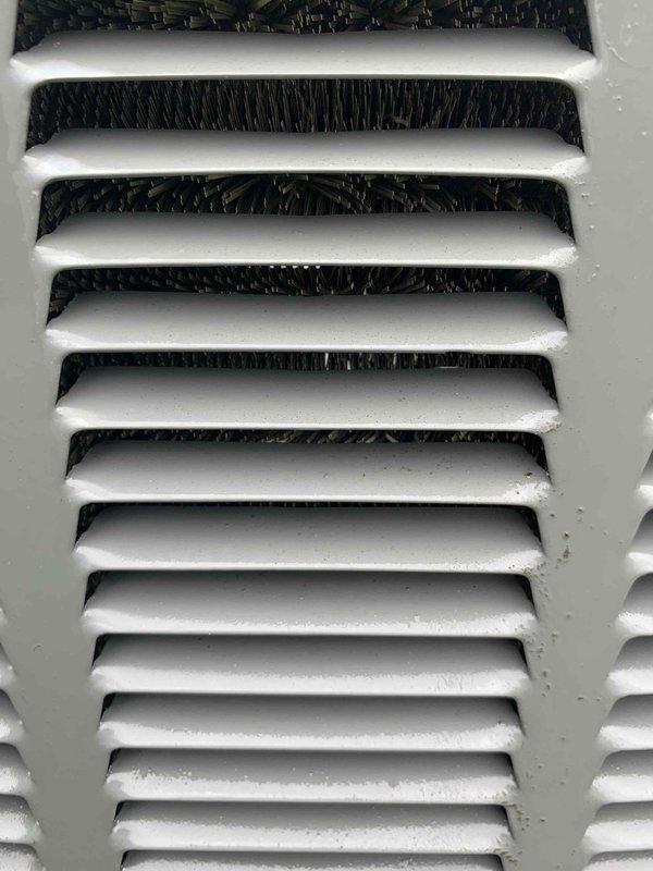Completed comprehensive cooling system tune-up on 10-year-old residential air conditioning unit located at side of property. Performed full system inspection including control board examination, electrical connections verification, and return air filter assessment. All components found operating within normal parameters, with control board LED indicators functioning properly and airflow pathways clear of obstructions.