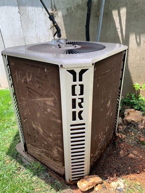 Completed seasonal tune-up maintenance on a 36-year-old York air conditioning system with Lennox evaporator coil located at side of house. Performed comprehensive inspection, cleaning, and testing of all system components to ensure optimal performance and efficiency for the cooling season.