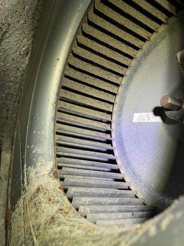 Completed comprehensive cooling season tune-up on single AC unit, including full system inspection of air handler and blower assembly. Inspected ductwork connections and blower wheel, noting normal dust accumulation on squirrel cage fan blades and housing; system operational and running within manufacturer specifications.