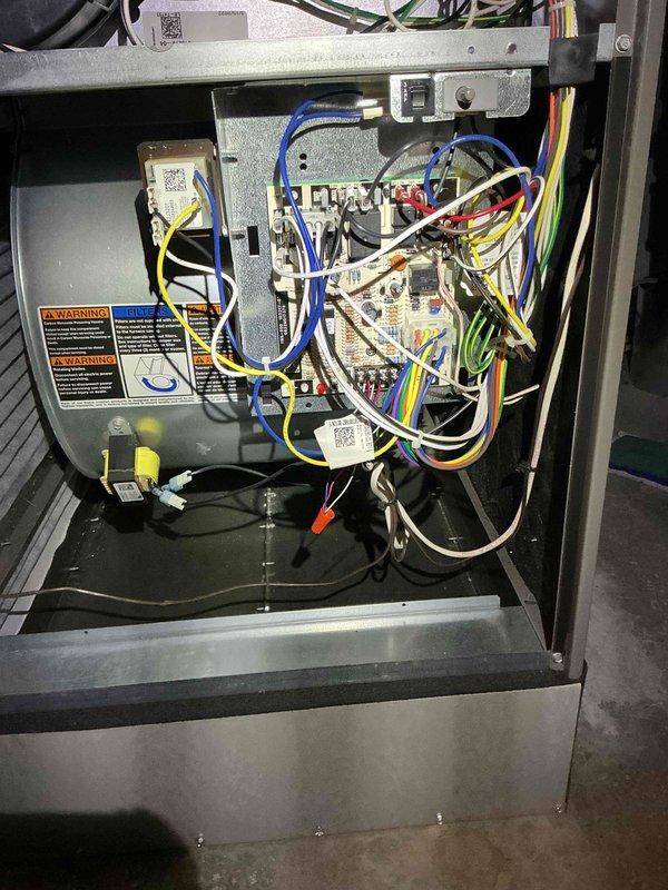 Responded to no cooling complaint and replaced failed blower motor with new Genteq 1HP 120V unit under warranty. Removed and disposed of defective motor assembly, installed replacement motor in blower housing, verified proper electrical connections to control board, and confirmed system operation upon completion.