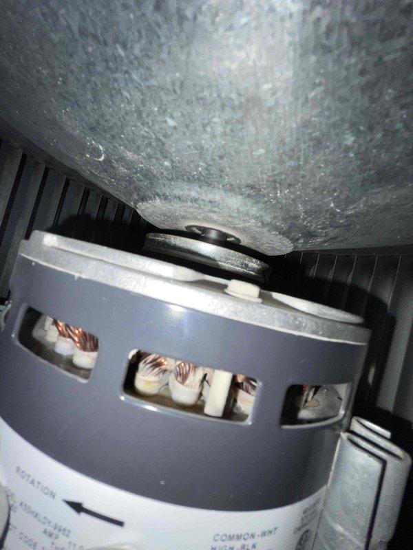 Responded to service call for 29-year-old air conditioning system with reported A-coil vibration during operation. Upon inspection, discovered blower motor with exposed copper windings and excessive dust and debris accumulation throughout the air handler cabinet and on interior surfaces. Removed and inspected return air vent cover, which showed signs of restricted airflow due to dirt buildup. System exhibited signs of extended period without maintenance, contributing to abnormal vibration and operational concerns. Advised customer of findings and recommended system shutdown until proper repairs could be completed.