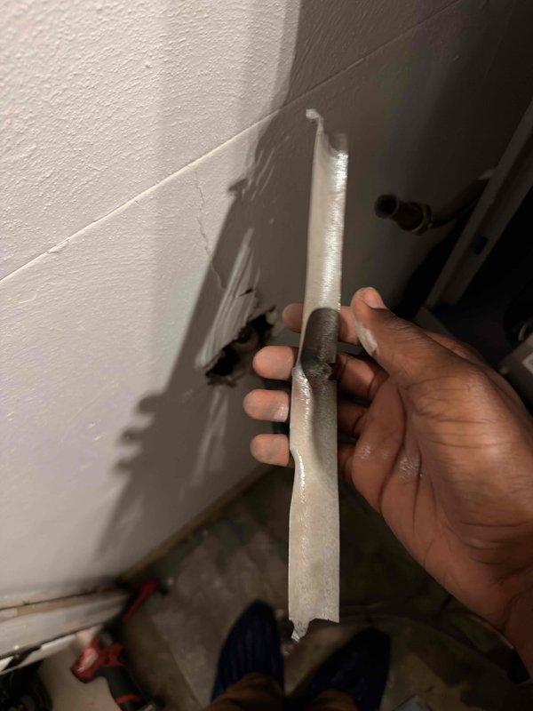 Responded to service call for 29-year-old air conditioning system with reported A-coil vibration during operation. Upon inspection, discovered blower motor with exposed copper windings and excessive dust and debris accumulation throughout the air handler cabinet and on interior surfaces. Removed and inspected return air vent cover, which showed signs of restricted airflow due to dirt buildup. System exhibited signs of extended period without maintenance, contributing to abnormal vibration and operational concerns. Advised customer of findings and recommended system shutdown until proper repairs could be completed.