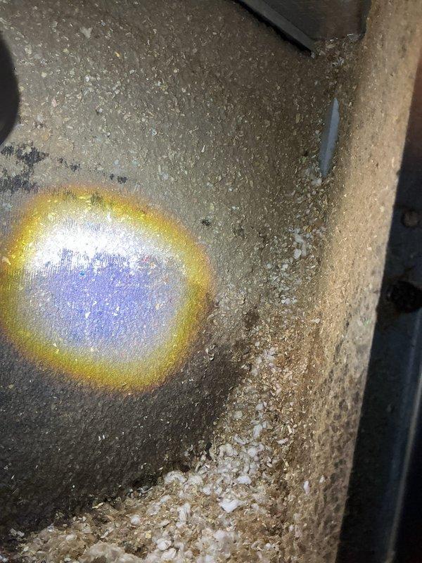 Responded to recall for frozen evaporator coil and no cooling condition. Upon arrival, found return air filter completely blocked with heavy dust and debris accumulation, resulting in severe airflow restriction. Inspected air handler unit located in attic and confirmed extensive dust buildup throughout system components and ductwork. Replaced clogged filter and verified proper airflow restoration after defrost cycle completed. System returned to normal cooling operation with adequate airflow across evaporator coil.