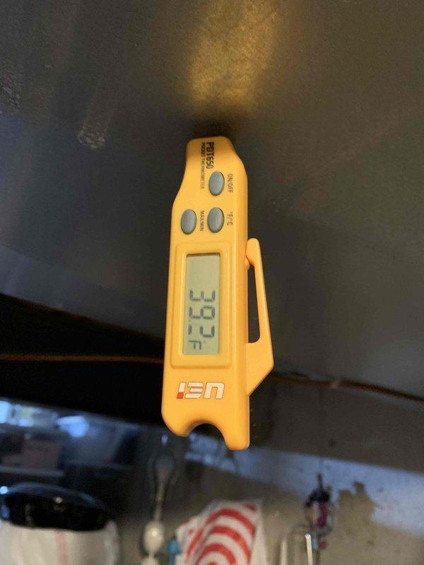 Responded to no cooling complaint on residential air conditioning unit located in side yard. Upon arrival, system was running but blowing warm air as reported. Performed temperature diagnostics using digital thermometer at supply and return registers. Supply air temperature measured 67.8°F, significantly above normal cooling range. Return air temperature measured 33.3°F, indicating abnormal temperature differential. Diagnosed system failure preventing proper cooling operation. Documented findings with thermal readings and photographs for service records. Unit is under 10 years old and requires repair to restore cooling function.