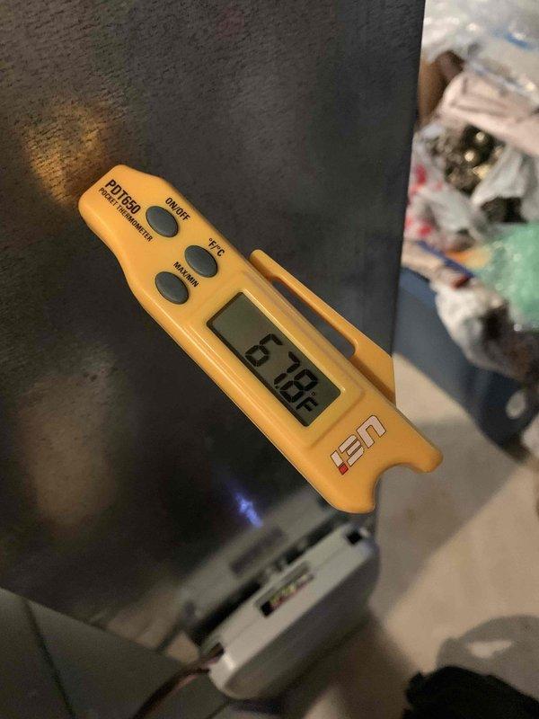 Responded to no cooling complaint on residential air conditioning unit located in side yard. Upon arrival, system was running but blowing warm air as reported. Performed temperature diagnostics using digital thermometer at supply and return registers. Supply air temperature measured 67.8°F, significantly above normal cooling range. Return air temperature measured 33.3°F, indicating abnormal temperature differential. Diagnosed system failure preventing proper cooling operation. Documented findings with thermal readings and photographs for service records. Unit is under 10 years old and requires repair to restore cooling function.