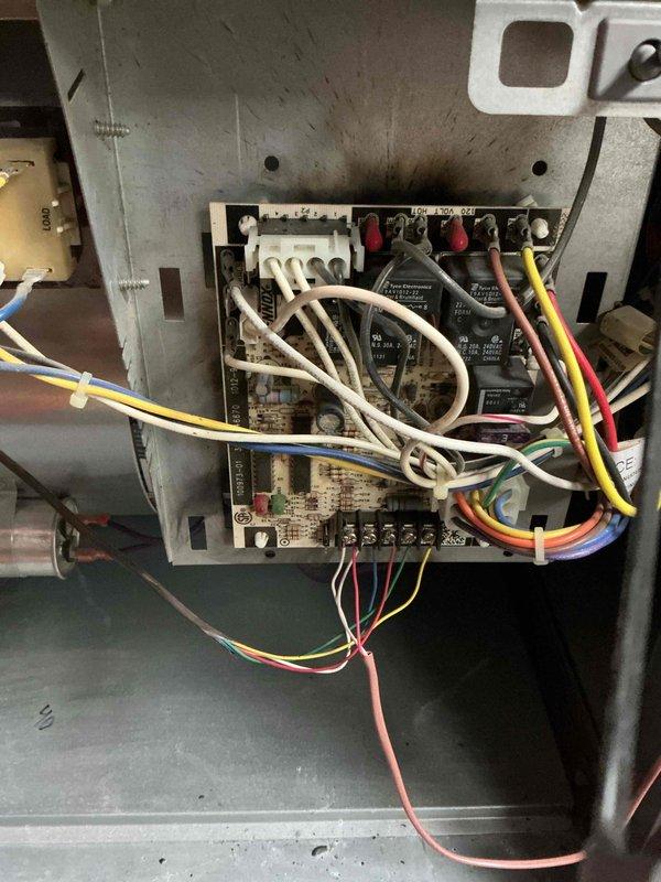Responded to no cooling call following reported electrical event involving utility transformer. Upon arrival, inspected single outdoor AC unit and found system completely non-operational. Removed access panel to control board compartment and performed comprehensive electrical diagnostic of low-voltage control circuit and line voltage connections. Inspection revealed control boards, wiring harnesses, and relay components appeared intact with no visible signs of electrical surge damage, burnt components, or compromised connections. However, confirmed complete loss of power to unit. Advised that primary issue stems from upstream electrical service disruption and recommended electrical contractor evaluate main service panel, dedicated disconnect, and circuit breaker for potential damage from power surge event before HVAC system can be safely restored to operation.