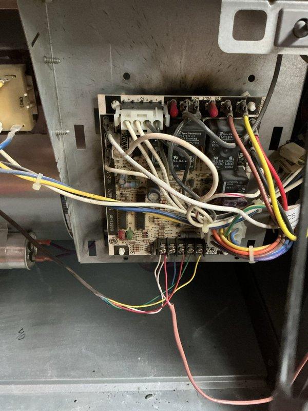 Responded to no cooling call following reported electrical event involving utility transformer. Upon arrival, inspected single outdoor AC unit and found system completely non-operational. Removed access panel to control board compartment and performed comprehensive electrical diagnostic of low-voltage control circuit and line voltage connections. Inspection revealed control boards, wiring harnesses, and relay components appeared intact with no visible signs of electrical surge damage, burnt components, or compromised connections. However, confirmed complete loss of power to unit. Advised that primary issue stems from upstream electrical service disruption and recommended electrical contractor evaluate main service panel, dedicated disconnect, and circuit breaker for potential damage from power surge event before HVAC system can be safely restored to operation.