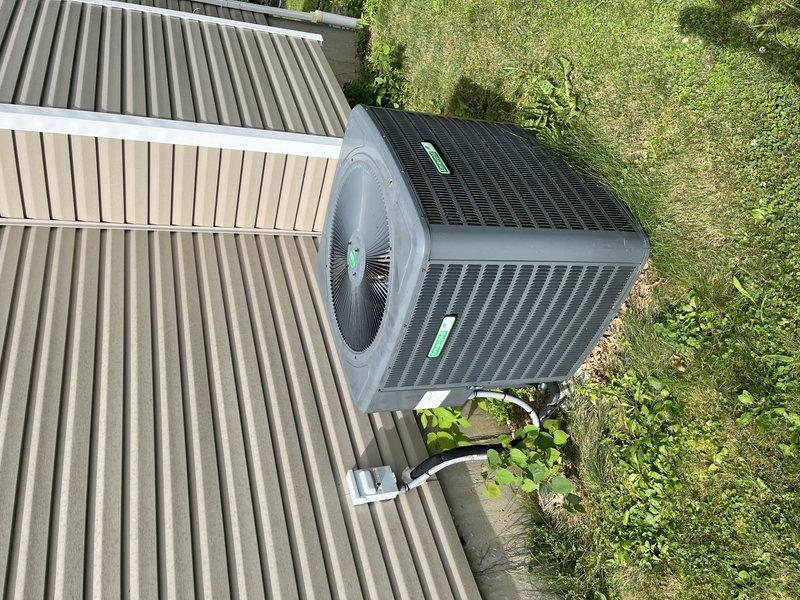Responded to no cooling complaint on residential air conditioning system. Upon arrival, performed complete system diagnostic on outdoor condensing unit located on concrete pad adjacent to structure. Inspected condenser coil, verified refrigerant lines, checked electrical connections, and tested compressor operation. System evaluated and necessary repairs identified to restore proper cooling function.