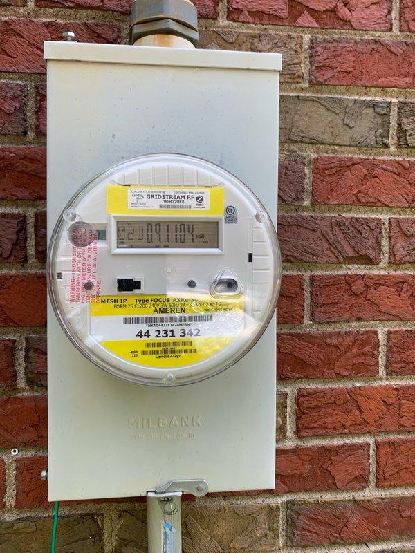 Performed consultation and site assessment for whole home surge protection installation. Evaluated existing electrical service including Milbank meter enclosure with Gridstream RF smart meter and main electrical panel configuration. Inspected panel containing main breaker assembly, multiple single-pole and double-pole branch circuit breakers rated at various amperage levels, and existing wiring infrastructure consisting of mixed-age conductors including cloth-wrapped legacy wiring and modern color-coded branch circuits. Documented current electrical service setup including conduit connections, grounding system, and available panel capacity to determine optimal surge protection device specifications and installation requirements for whole home surge suppression system.
