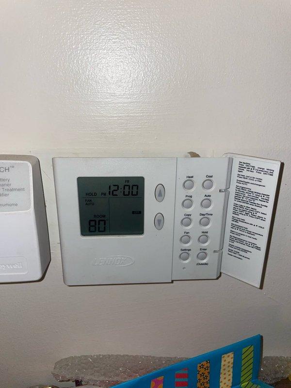 Responded to no cooling complaint on 19-year-old Lennox air conditioning system. Upon arrival, found unit not maintaining temperature despite mild outdoor conditions. Verified thermostat operation and display showing 80°F reading. Inspected electrical panel and confirmed proper breaker positioning for A/C circuit. System has history of motor and control replacement from 2010. Performed diagnostic evaluation of cooling system performance and identified inadequate cooling capacity relative to current outdoor temperatures and system age.