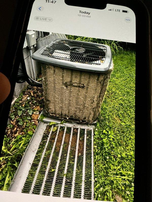 Responded to no cooling call on 10+ year old ground-level unit located at rear of residence. Upon arrival, found outdoor condensing unit with significant exterior corrosion and deterioration on cabinet panels. Performed system diagnostics and troubleshooting to identify cause of cooling failure. Documented equipment condition with photos showing advanced rust on metal casing and components, indicating unit age and exposure to weather elements over extended service life.