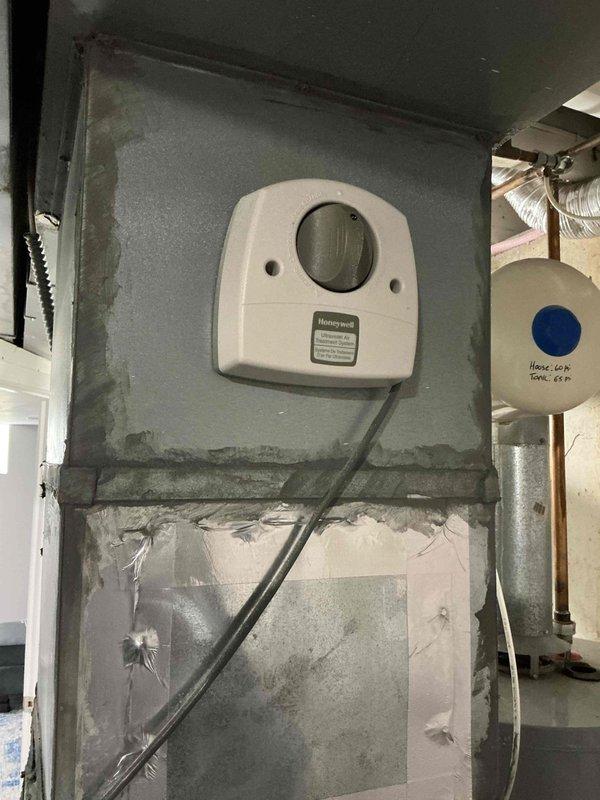 Responded to no cooling call with ice formation on evaporator coil. Upon arrival, found 9-year-old AC system with frozen evaporator coil. Connected SMAN460 manifold gauge to system and recorded operating pressures and temperatures. Suction pressure reading of 196 PSIG and discharge pressure of 287.7 PSIG indicated system operating conditions. Superheat and subcooling values were analyzed to diagnose airflow restriction causing coil icing. Inspected evaporator coil assembly and identified reduced airflow across coil fins as primary cause of freezing condition. System was shut down to allow ice to melt from coil surface. Recommended filter replacement and verification of proper airflow once coil has fully thawed to restore normal cooling operation.