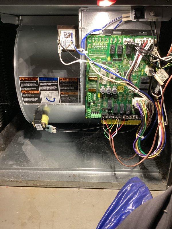 Completed comprehensive cooling system tune-up on a 2-year-old residential AC unit located at side of home. Performed full system inspection including control board diagnostics, blower motor examination, electrical connections verification, and replaced air filter per customer request. All components found operating within normal parameters with no deficiencies noted.