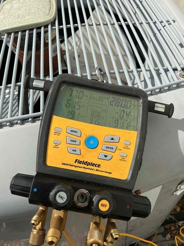 Responded to no cooling call following previous day's frozen evaporator coil diagnosis. Unit had been powered off to allow coil to thaw. Upon arrival, confirmed system was operational again after thaw period. Instructed homeowner to keep unit off to prevent refreezing until proper diagnosis and repairs could be completed. Connected manifold gauges and performed system pressure and temperature diagnostics to identify root cause of freezing condition. Measurements indicated abnormal operating temperatures and pressures consistent with restricted airflow or low refrigerant charge. Documented system readings for further evaluation and repair recommendations.