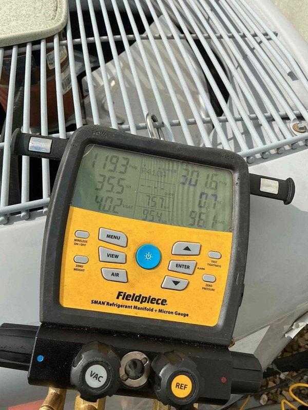 Responded to no cooling call following previous day's frozen evaporator coil diagnosis. Unit had been powered off to allow coil to thaw. Upon arrival, confirmed system was operational again after thaw period. Instructed homeowner to keep unit off to prevent refreezing until proper diagnosis and repairs could be completed. Connected manifold gauges and performed system pressure and temperature diagnostics to identify root cause of freezing condition. Measurements indicated abnormal operating temperatures and pressures consistent with restricted airflow or low refrigerant charge. Documented system readings for further evaluation and repair recommendations.