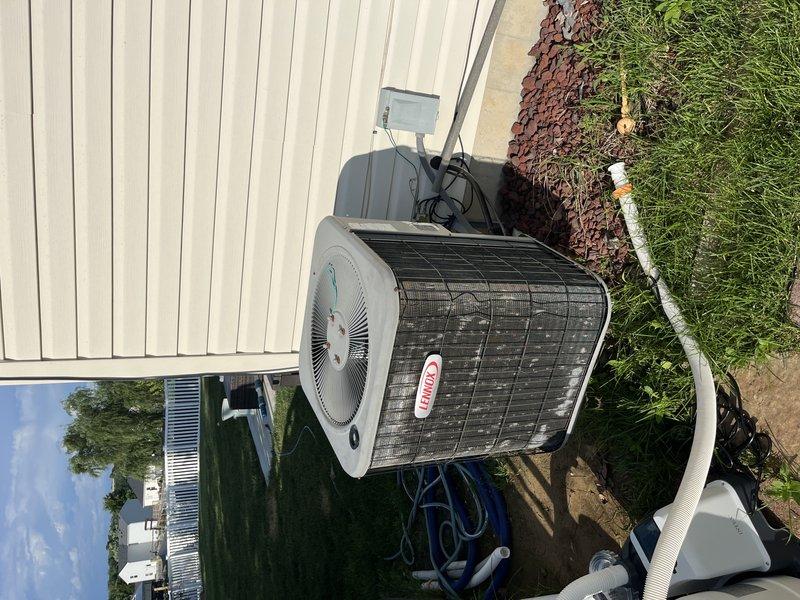 Responded to service call for loud noise coming from downstairs when AC system was running. Inspected 21-year-old Lennox outdoor condenser unit and interior air handler/ductwork in basement. Upon examination, identified noise source originating from indoor HVAC components. Performed diagnostic evaluation of both outdoor condensing unit and indoor air handling equipment to isolate mechanical issue causing excessive operational noise during cooling cycle.