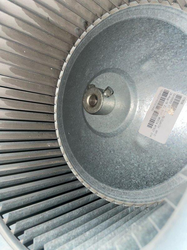 Responded to report of air conditioning system not cooling properly overnight with Nest thermostat not blowing cold air. Upon arrival, system was operational and cooling effectively to setpoint of 75°F. Performed diagnostic inspection of indoor air handler, examining blower wheel assembly for potential airflow restrictions or mechanical issues. Verified proper system operation, confirmed adequate airflow through blower assembly, and documented thermostat functioning correctly in cooling mode at time of service.