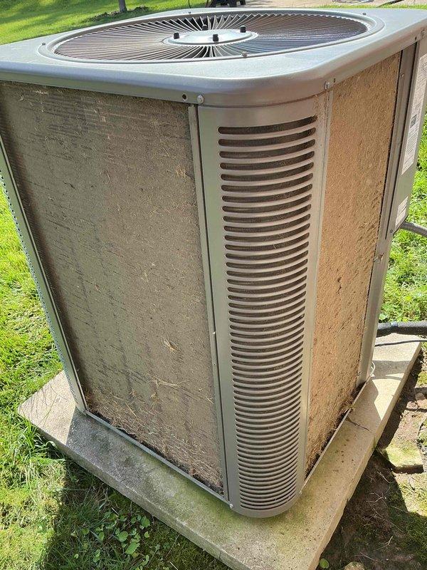 Completed comprehensive Supertune maintenance service on residential HVAC system consisting of one outdoor condensing unit and one indoor furnace unit located in basement. Performed thorough inspection, cleaning, and testing of both components to ensure optimal system performance and efficiency. Outdoor condenser unit showed signs of age and weathering with accumulated dirt and debris on exterior panels and coils; cleaned and serviced unit accordingly. Indoor furnace unit inspected with front panel removed, revealing dual blower motors, copper refrigerant lines, PVC condensate drain, control boards, and electrical connections all functioning properly. All system components tested and confirmed operational within manufacturer specifications.