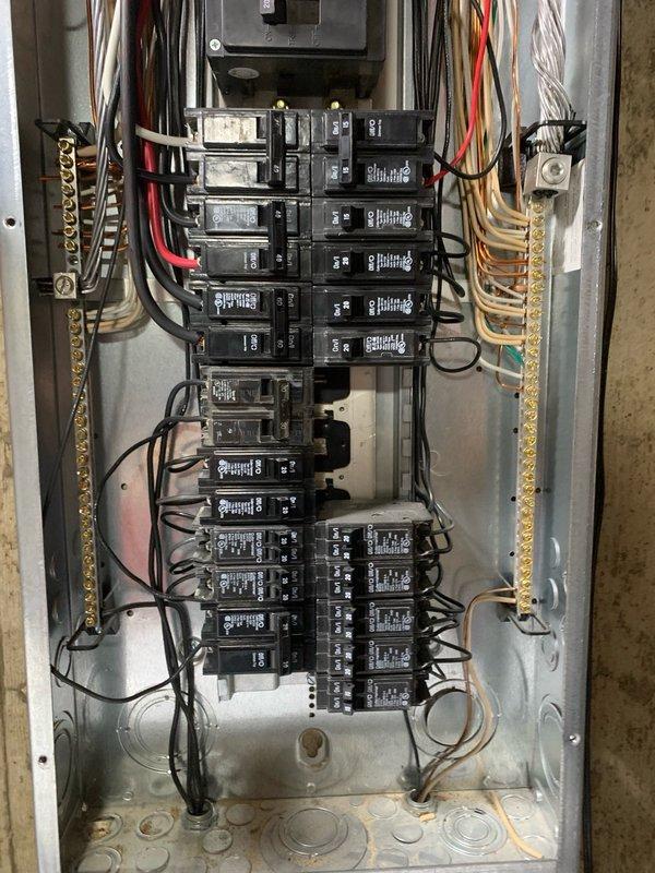 Responded to service call for multiple electrical issues including non-functional water heater traced to electrical panel problem, replaced bathroom light fixture, resolved flickering bedroom light, and diagnosed basement fluorescent fixture that remained inoperative after customer's tube replacement attempt. Inspected and serviced main electrical panel, addressing circuit breaker connections affecting water heater operation, and completed fixture replacements and lighting repairs throughout residence.
