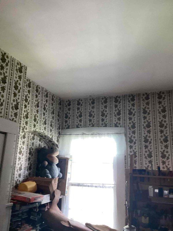 Responded to customer report of A/C unit leaking when operational. Inspected 10+ year old attic-mounted system and identified leak source. Examined electrical components including capacitor and contactor, verified proper connections and system functionality. System tested and confirmed operational with leak issue resolved.