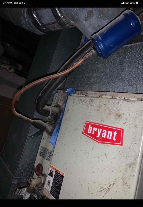 Responded to no-cool service call for residential HVAC system. Upon arrival, inspected Goodman furnace unit and Bryant outdoor condenser, both showing signs of age and normal operational wear. Diagnosed inoperative blower fan issue, removed furnace access panel to examine internal components including wiring harnesses, motor connections, and control board. Verified power supply, tested capacitor functionality on outdoor unit, and checked electrical connections throughout system. Completed diagnostic assessment and documented equipment condition with photographic evidence for customer records.