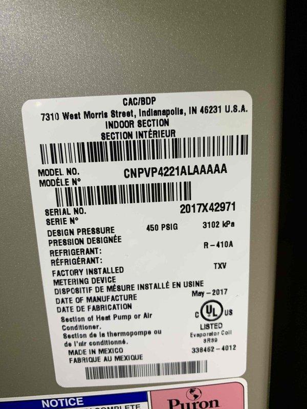 Responded to emergency no-cooling call on residential air conditioning system. Upon arrival, inspected GAC/BDP indoor unit model CNPVP4221ALAAAAA (manufactured May 2017) utilizing R-410A refrigerant with factory-installed TXV metering device. Verified unit specifications and confirmed proper refrigerant type. Documented equipment condition through photography for service records. System assessed and necessary observations recorded for customer follow-up regarding cooling concerns.