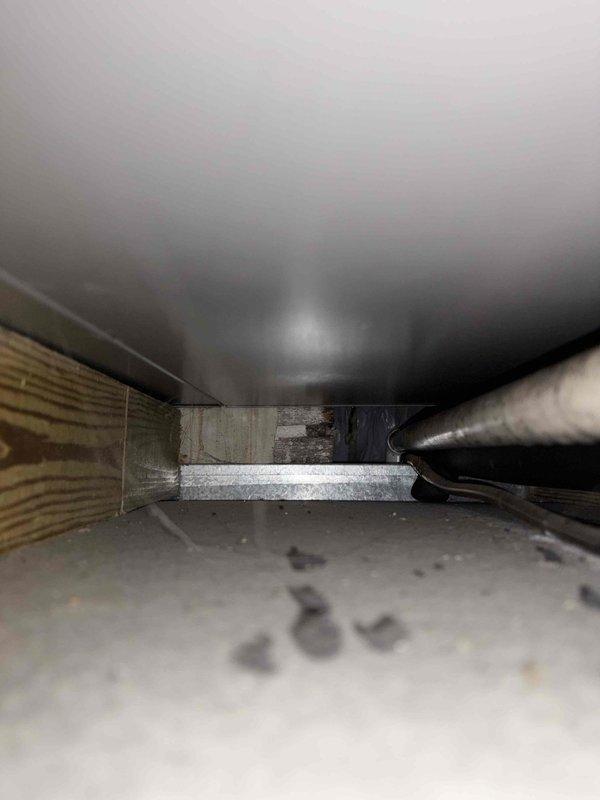 Responded to service call for dual-unit cooling system reported to be cycling off at set temperature. Upon arrival, performed diagnostic inspection of recently installed HVAC equipment located in crawlspace area. Examined refrigerant lines, ductwork connections, and unit mounting to identify potential issues with newer system operation. Documented installation conditions including flexible ductwork routing, refrigerant line insulation, and equipment positioning for further assessment of cooling performance concerns.