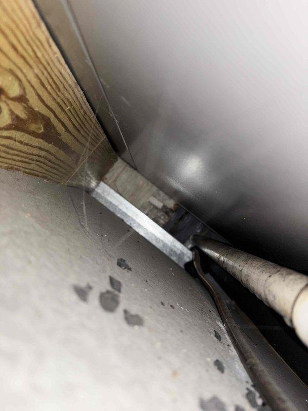 Responded to service call for dual-unit cooling system reported to be cycling off at set temperature. Upon arrival, performed diagnostic inspection of recently installed HVAC equipment located in crawlspace area. Examined refrigerant lines, ductwork connections, and unit mounting to identify potential issues with newer system operation. Documented installation conditions including flexible ductwork routing, refrigerant line insulation, and equipment positioning for further assessment of cooling performance concerns.