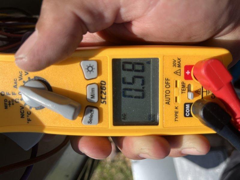Responded to service call for air conditioning unit that would not hold refrigerant charge after customer attempted self-service recharging. Upon arrival, performed diagnostic testing using digital multimeter to assess electrical components and system performance. Testing revealed refrigerant leak in the system preventing proper charge retention. Conducted thorough inspection of refrigerant lines, connections, and components to identify leak source affecting the entire unit's cooling capacity.