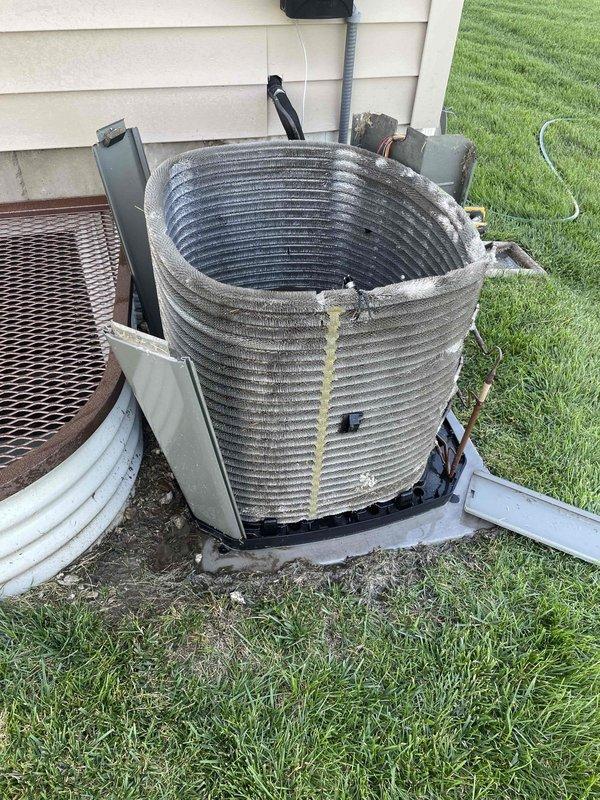 Responded to no cooling complaint on 6-year-old Trane system (Model 4TTR3030H1000NA). Upon inspection, found outdoor condenser coil heavily clogged with dirt, debris, and contamination causing severely restricted airflow and loss of cooling capacity. Thoroughly cleaned condenser coil, restored proper airflow, verified system operation, and confirmed unit cooling effectively. Advised customer on importance of regular maintenance to prevent future efficiency issues.