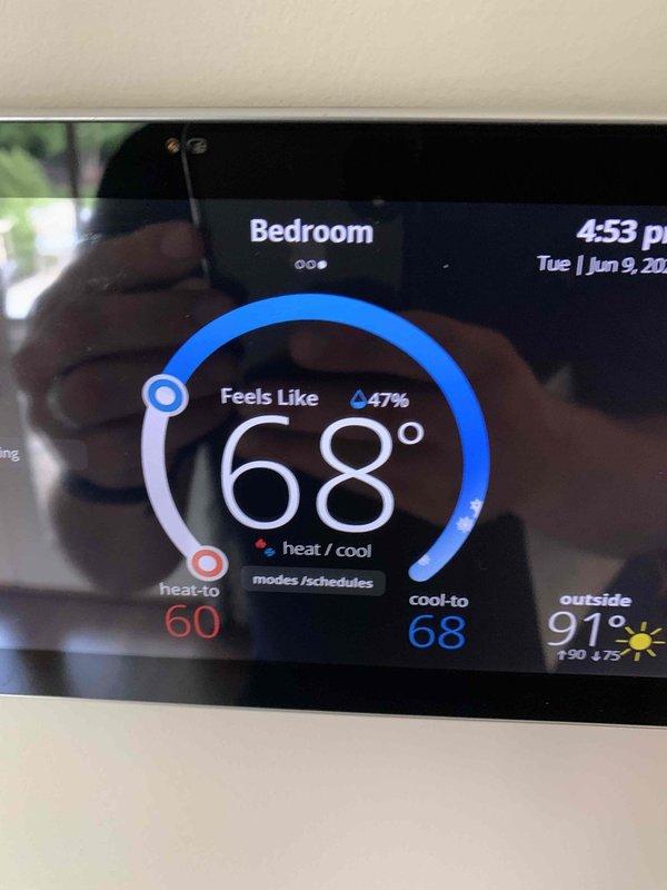 Responded to complaint of excessive humidity in two upstairs rooms on a four-unit HVAC system. Inspected upstairs unit and confirmed low refrigerant charge as previously reported. Verified thermostat readings in Family Room (69°F, 39% humidity) and Bedroom (68°F, 47% humidity), noting elevated humidity levels and proper temperature control. Advised customer to keep affected unit shut down until refrigerant service can be completed to prevent compressor damage.